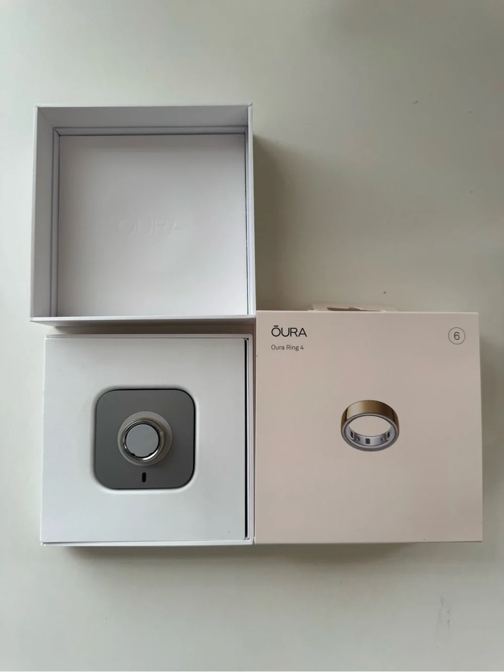 Oura Ring 4 Box with Gold Ring Illustration
